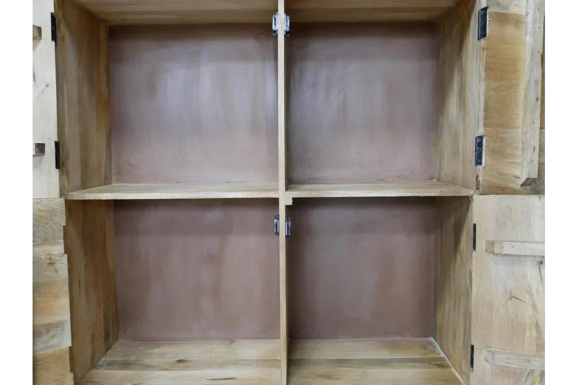 Natural wood cabinet interior with four shelves and metal hinges