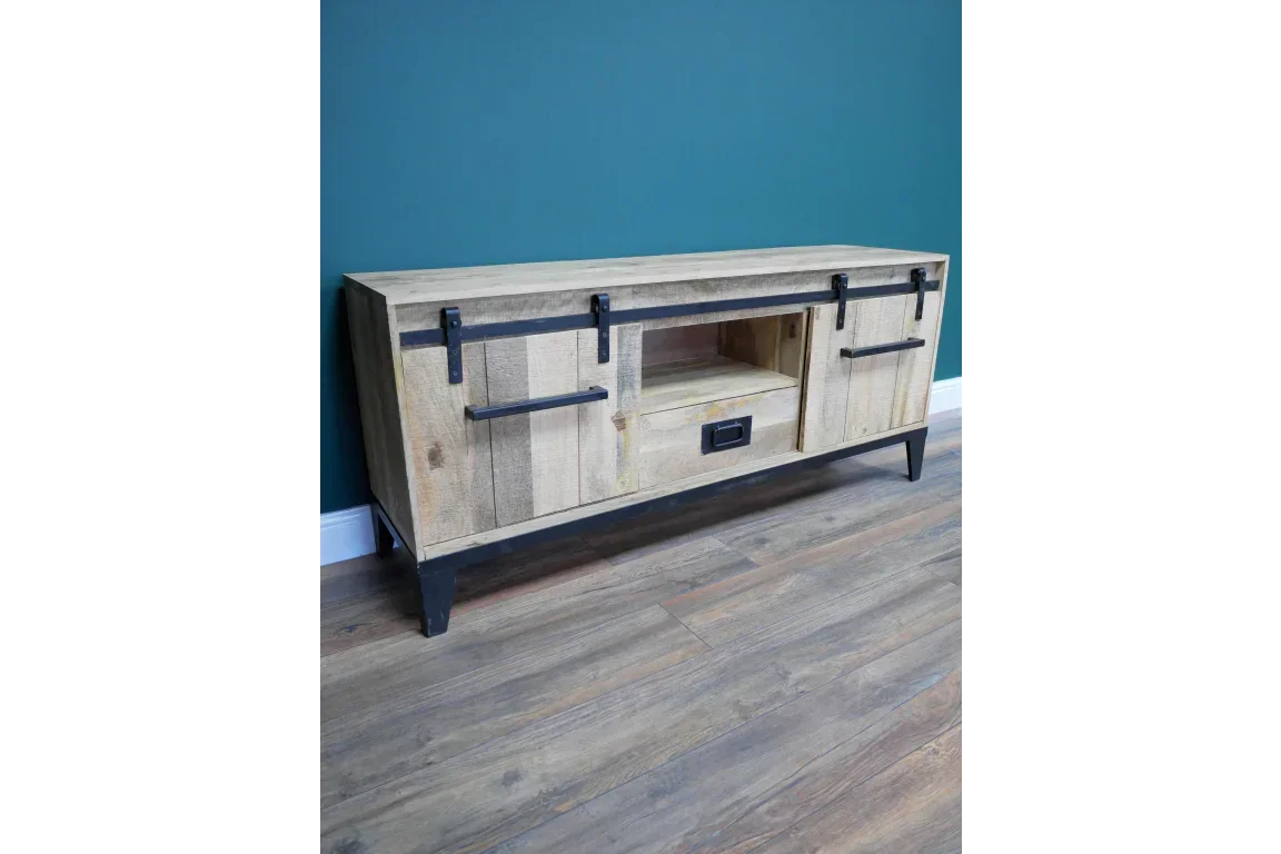 Rustic wooden TV unit with black metal legs, sliding barn doors, and central storage drawer