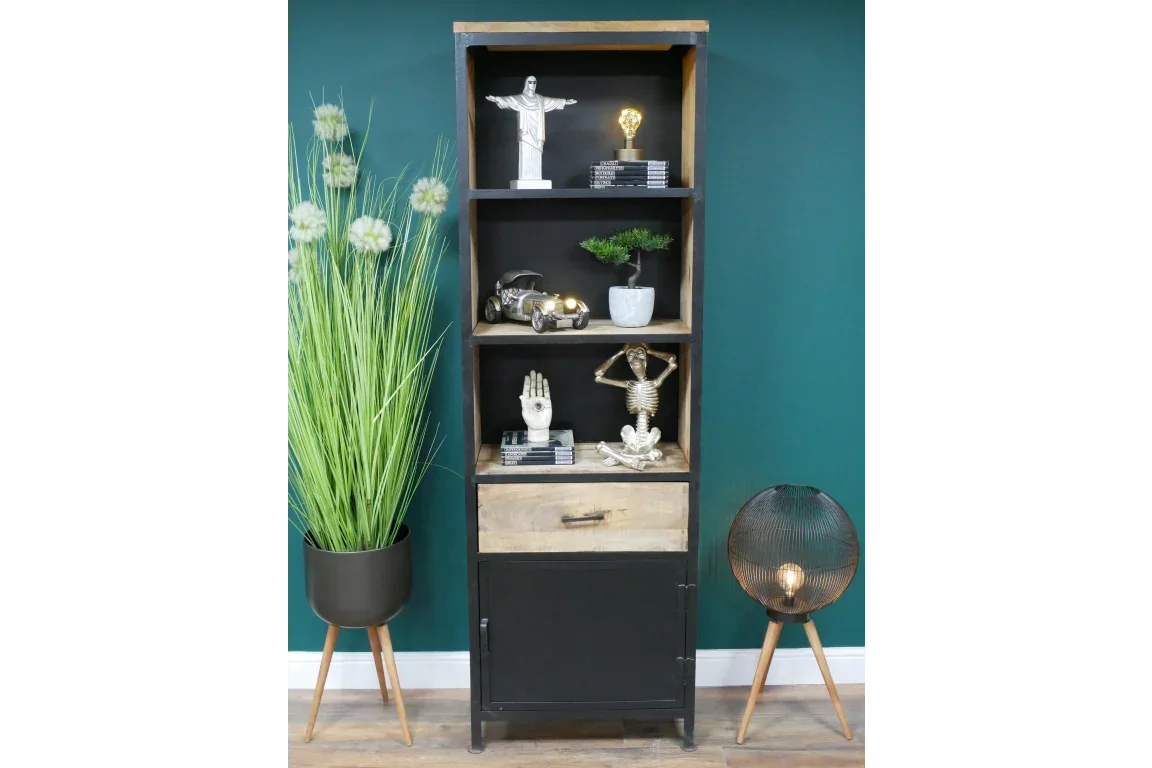 Tall wood and metal shelving unit with decorative ornaments, potted plant and modern floor lamp
