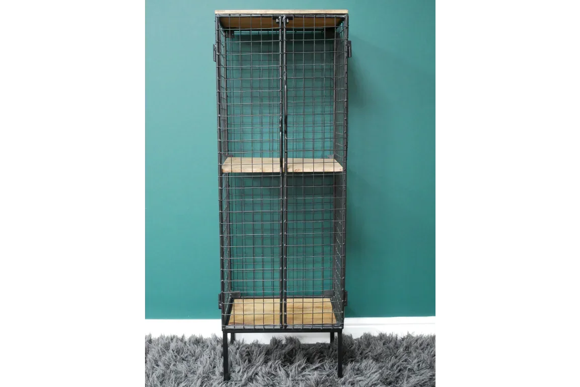 Black metal wire storage cabinet with wood shelves against teal wall