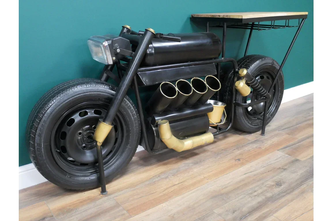 Black and gold motorcycle-shaped console table with wooden top and metal frame