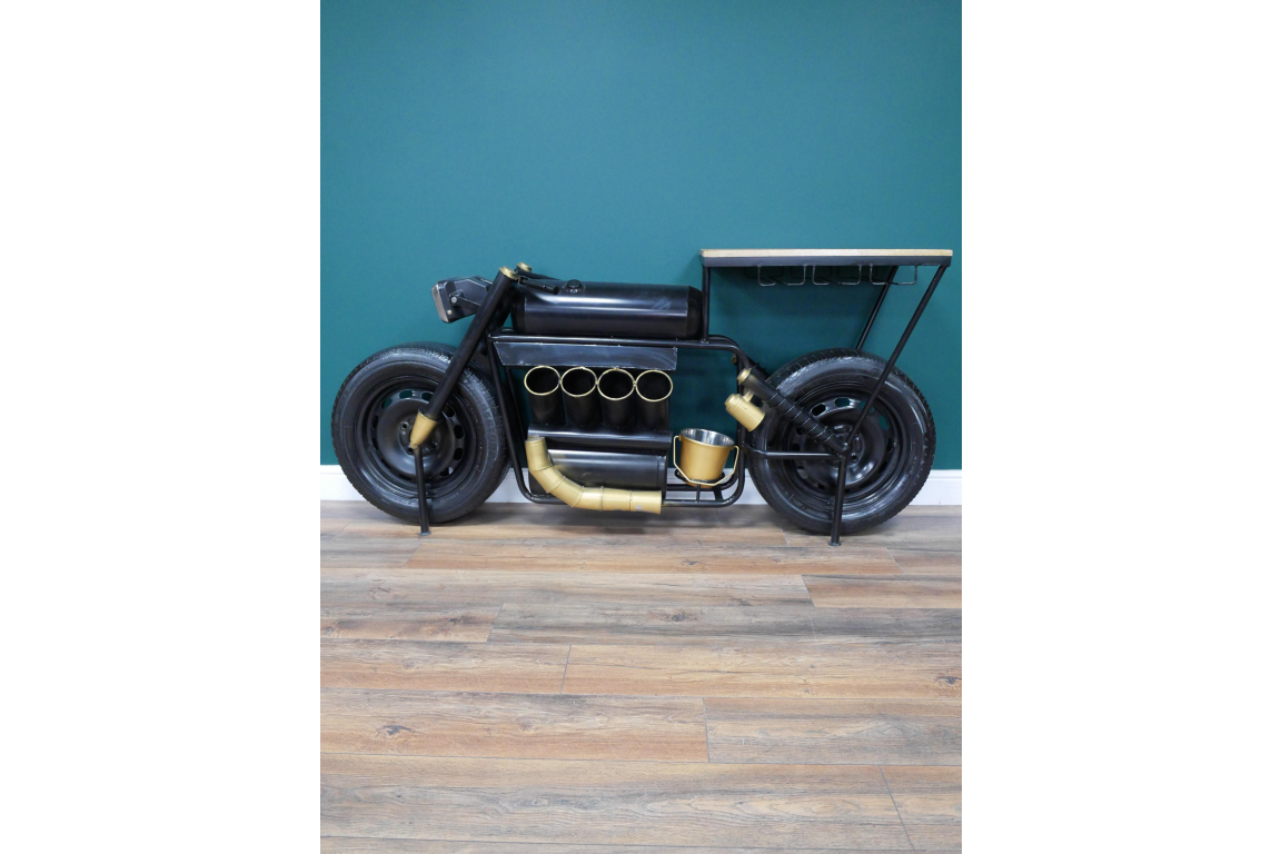 Black and gold motorcycle-shaped bar table with bottle holder and wooden tabletop