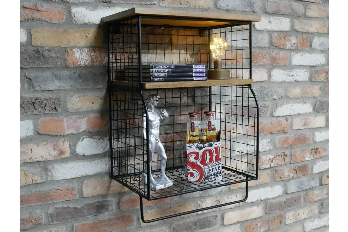 Industrial wire wall shelf with wooden accents, books, lamp, and drinks storage