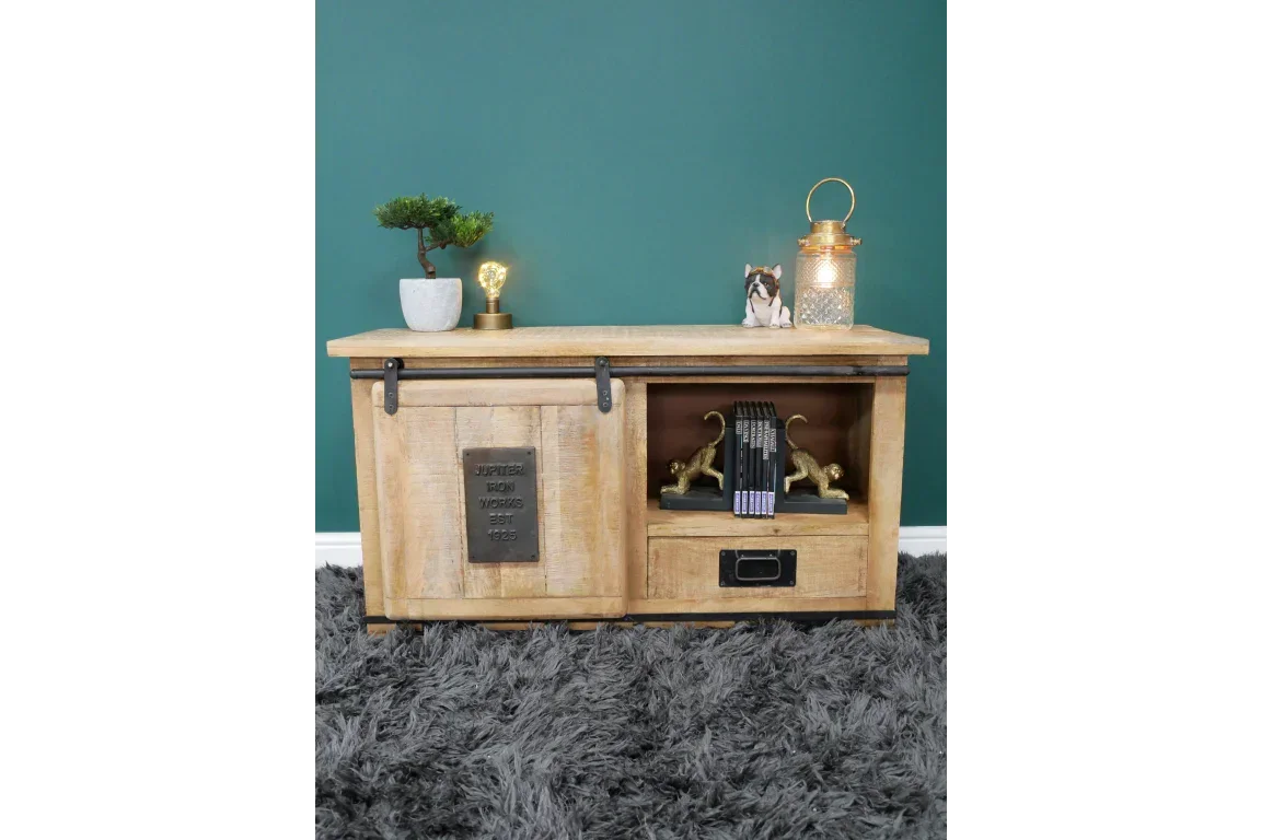 Rustic wood TV unit with sliding door, metal accents, open shelves and decor on top