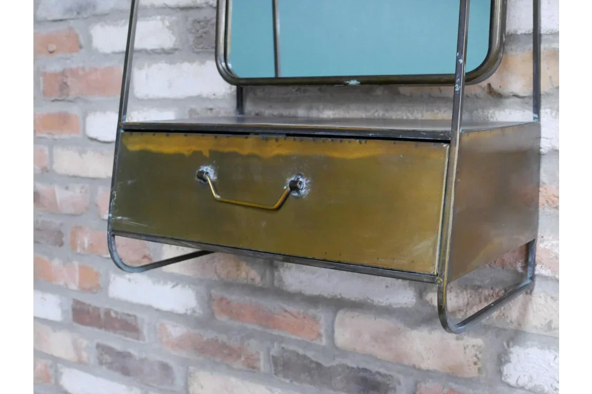 Industrial metal wall shelf with drawer and handle, mounted on exposed brick wall