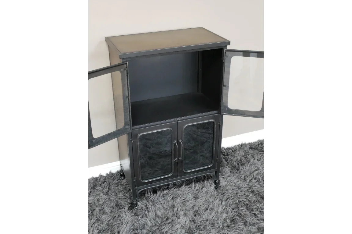 Black metal storage cabinet with glass doors open, placed on grey rug against beige wall