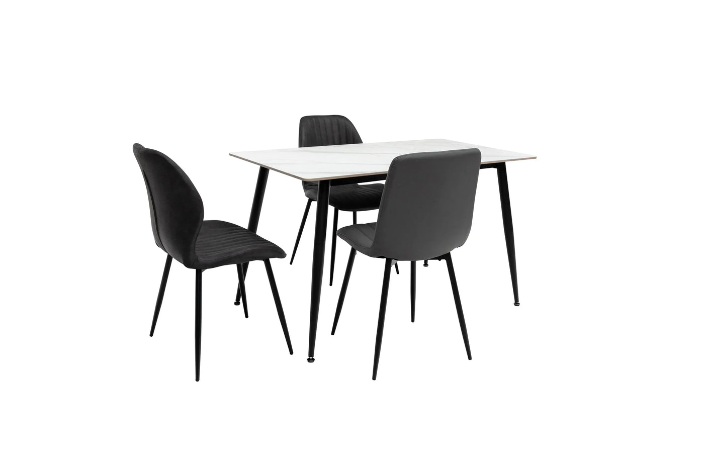 Modern dining table with white top and three black upholstered chairs on black metal legs