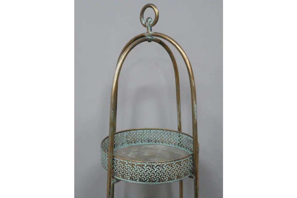 Antique brass metal stand with circular tray and decorative sides