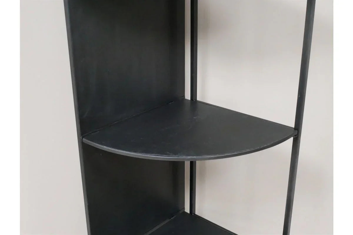 Black metal corner shelving unit with a curved shelf, close-up detail
