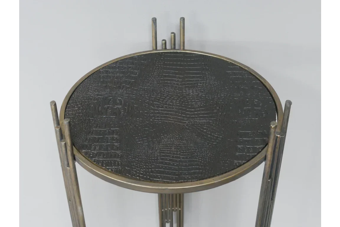 Round side table with embossed black faux leather top and gold metal frame