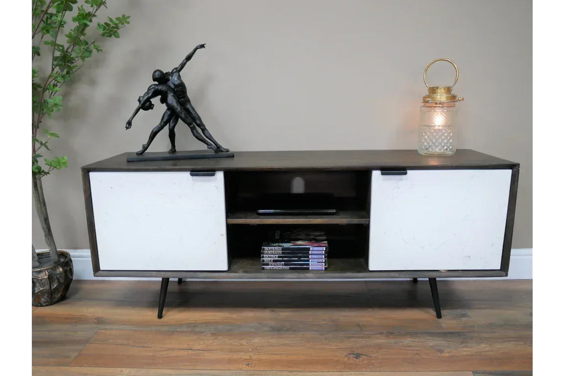 Modern TV unit with white doors, open shelving and black legs on wooden floor