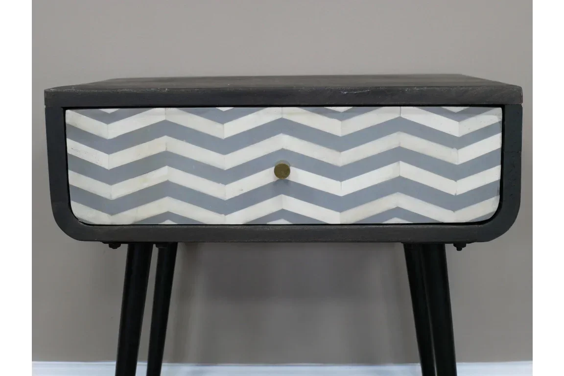 Chevron pattern bedside table with black legs and grey and white drawer front