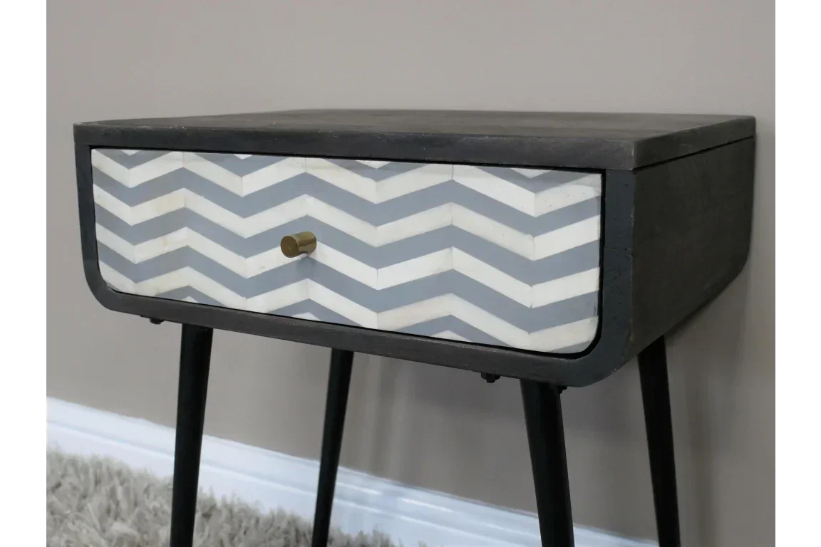 Grey and white chevron bedside table with single drawer and brass handle