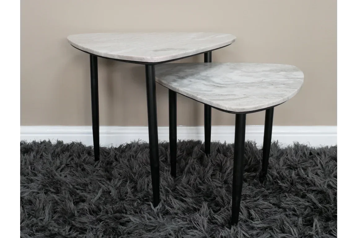 Marble effect nesting side tables with black legs on grey shaggy rug