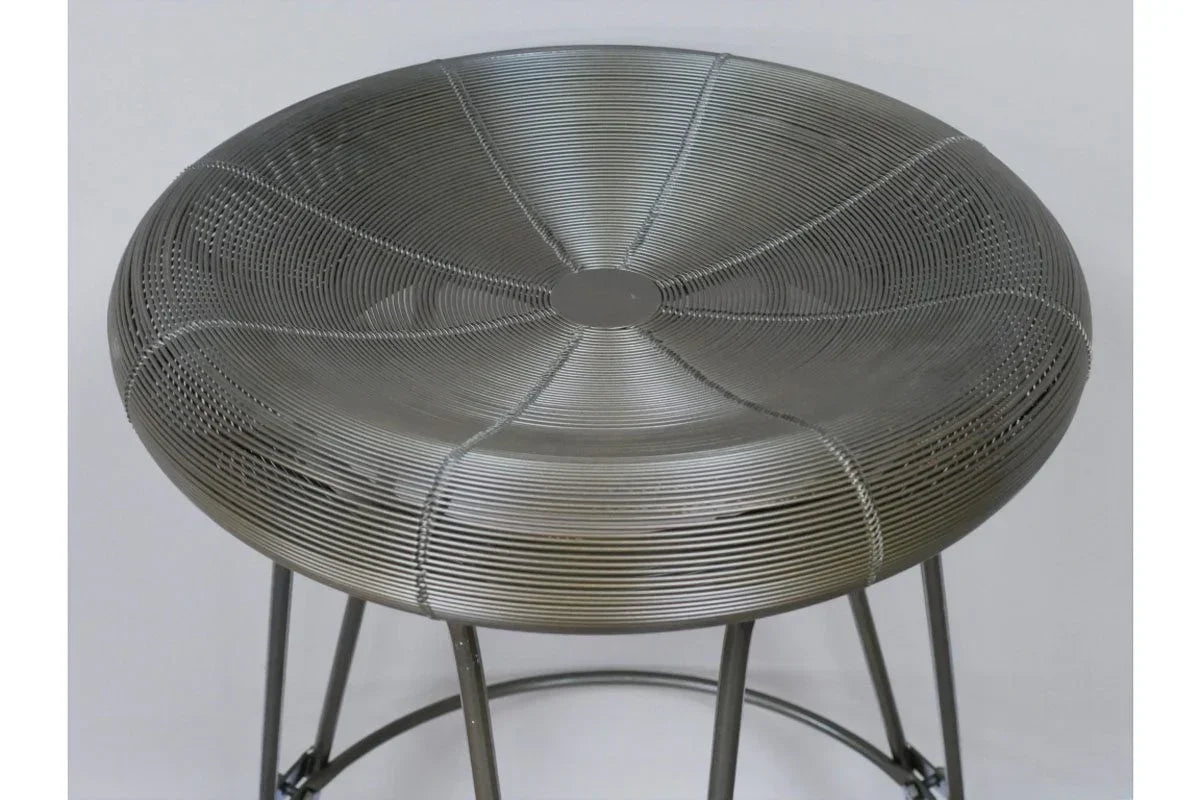 Round metal bar stool with wire seat and slim legs, modern industrial furniture design