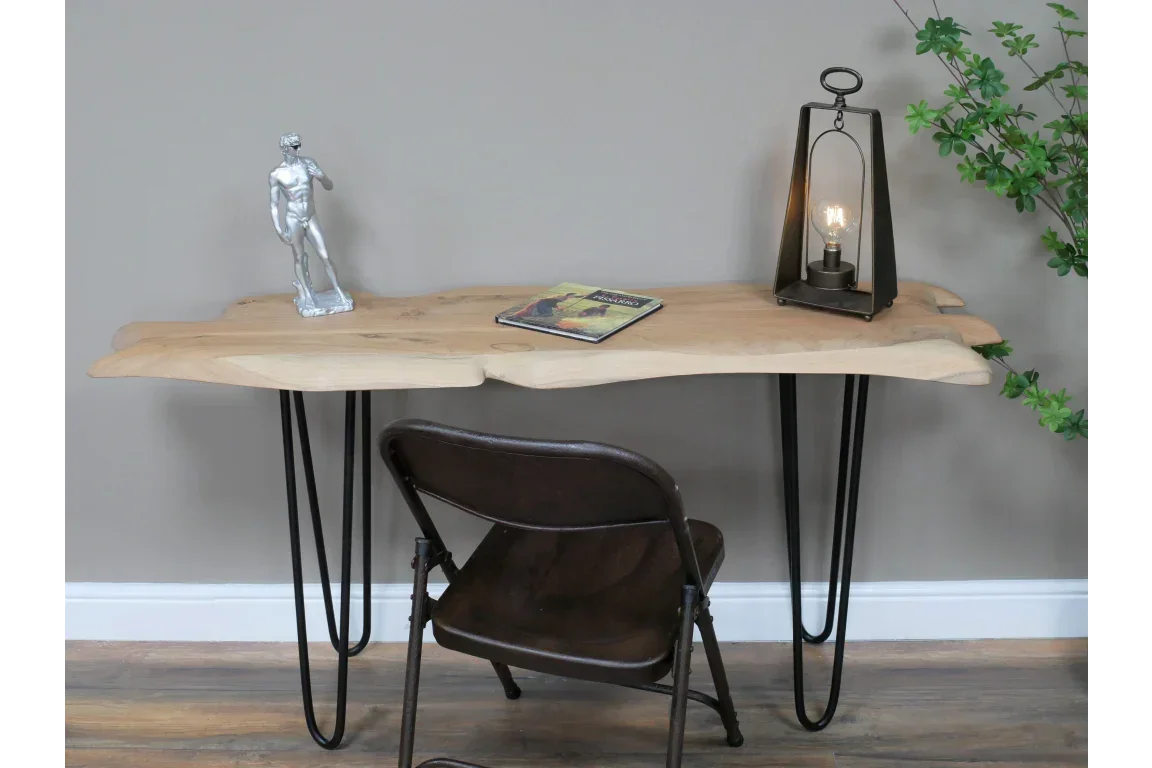 Live edge wooden console table with black hairpin legs and minimalist decor