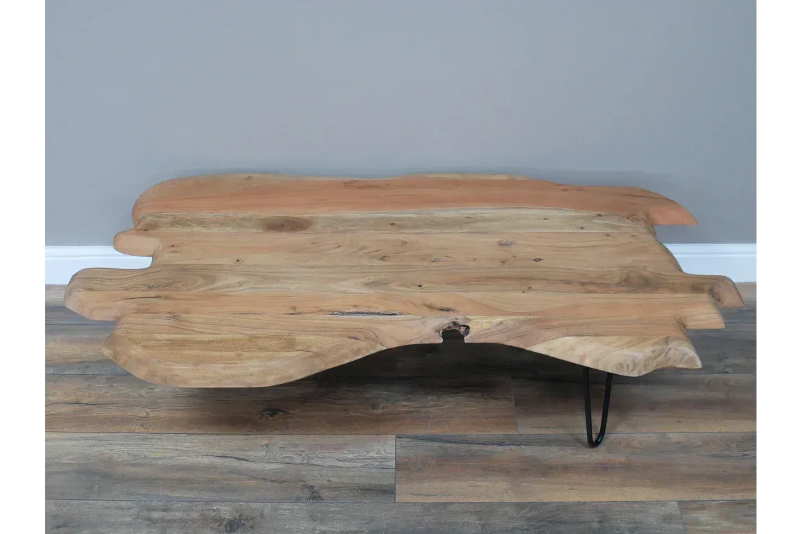 Live edge wooden coffee table with natural finish and black metal hairpin legs