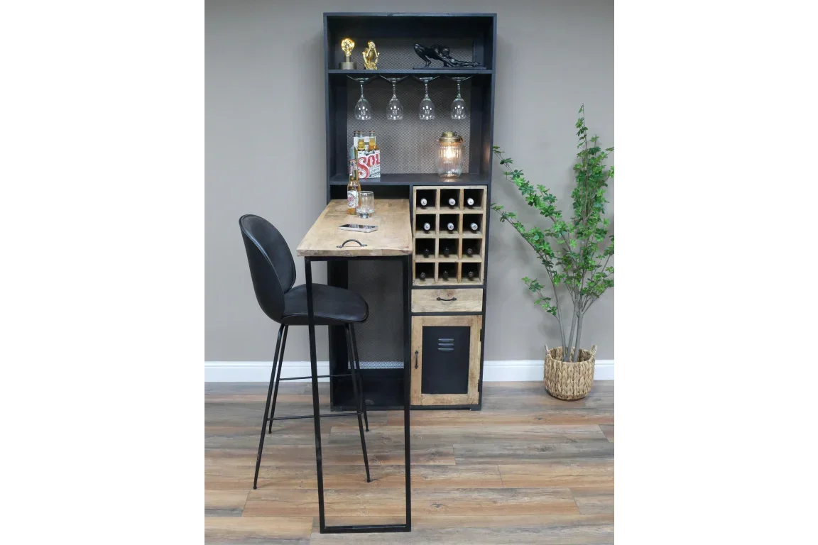 Industrial home bar table with wine rack, shelves, and black bar stool on wooden floor