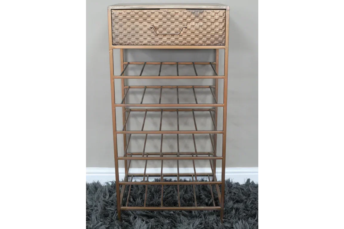 Bronze metal wine rack with textured drawer and six bottle shelves on grey rug