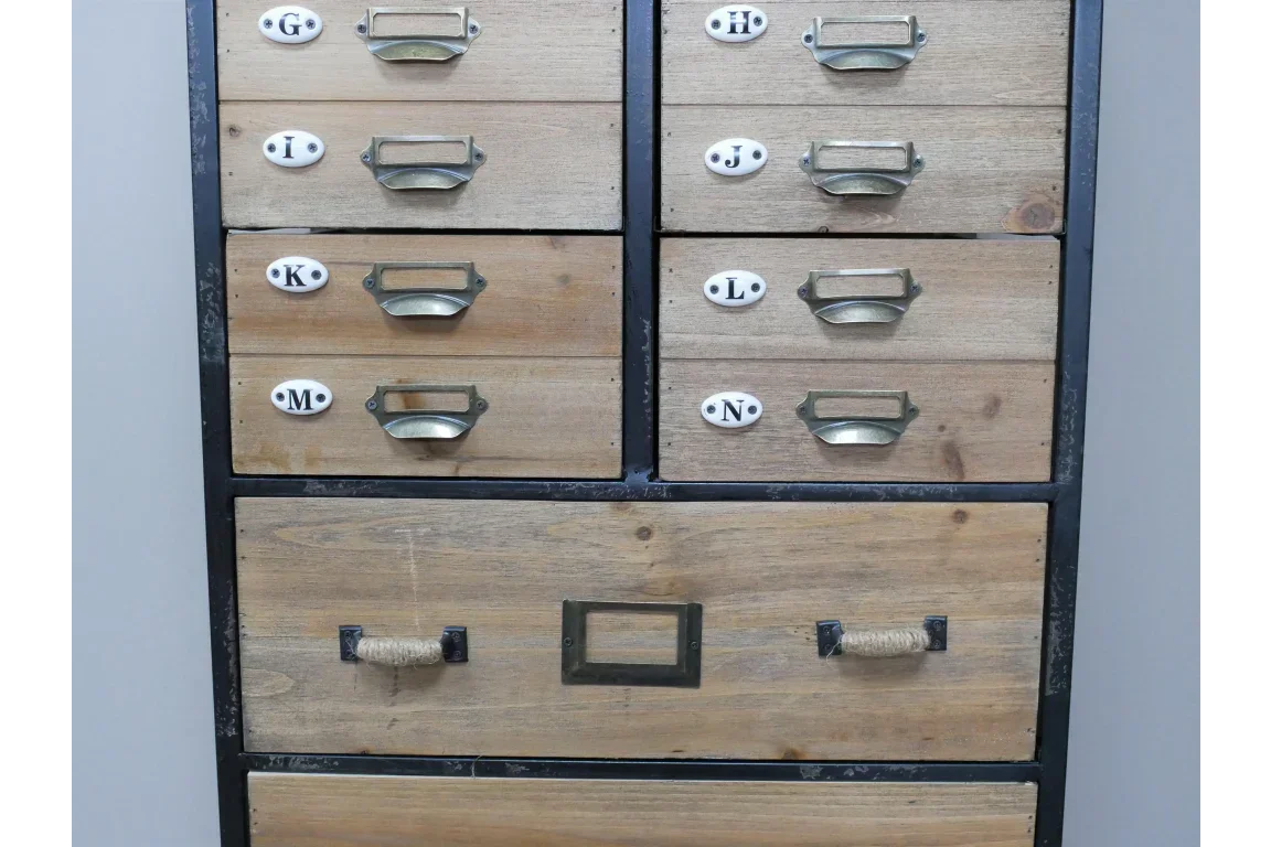Industrial storage cabinet with labeled wooden drawers and metal handles