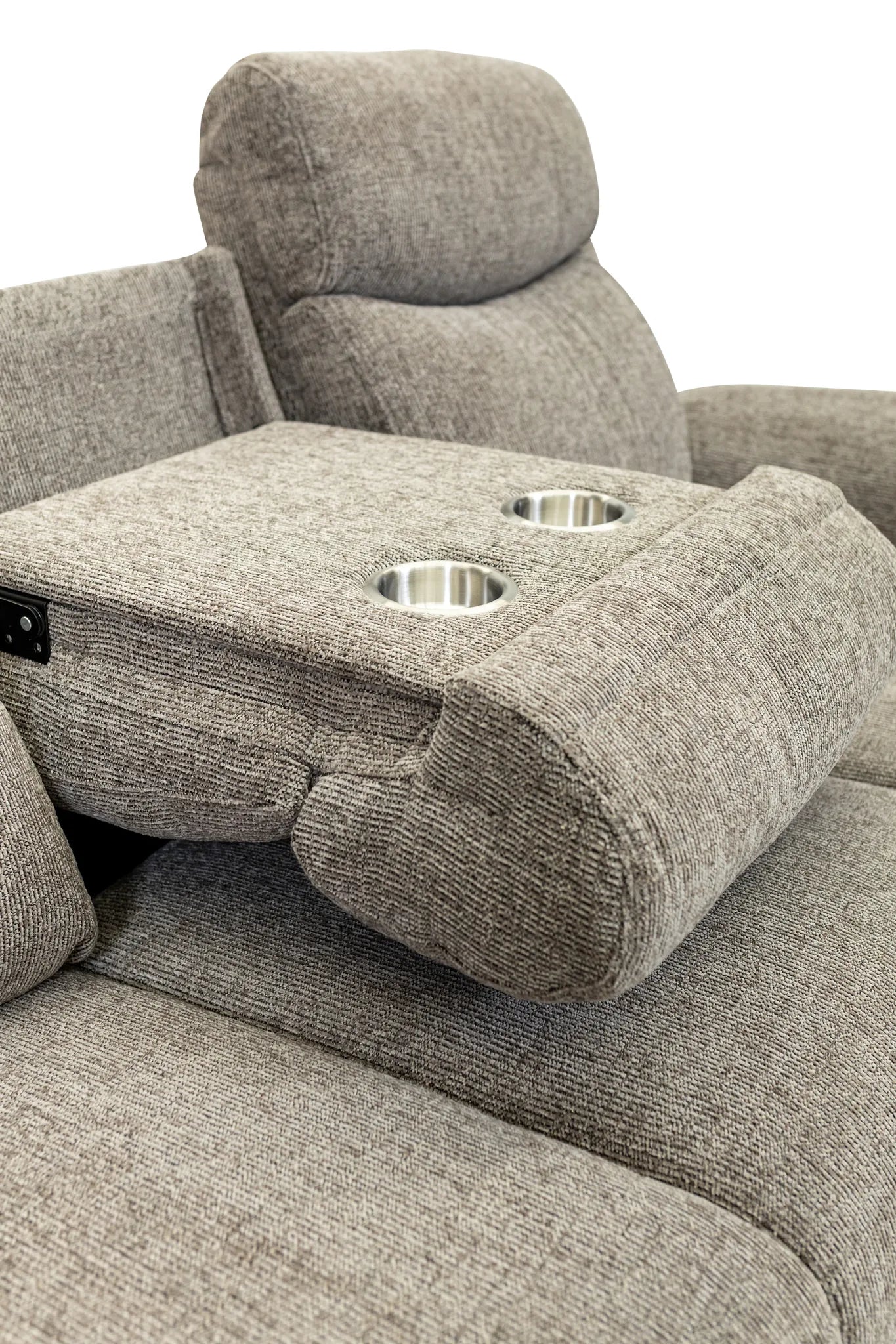 Close-up of a gray upholstered recliner chair with a center armrest featuring two cup holders and a power control switch, set against a plain white background.