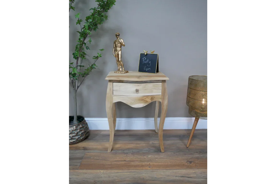 Solid wood bedside table with single drawer, curved legs, decorative statue and chalkboard