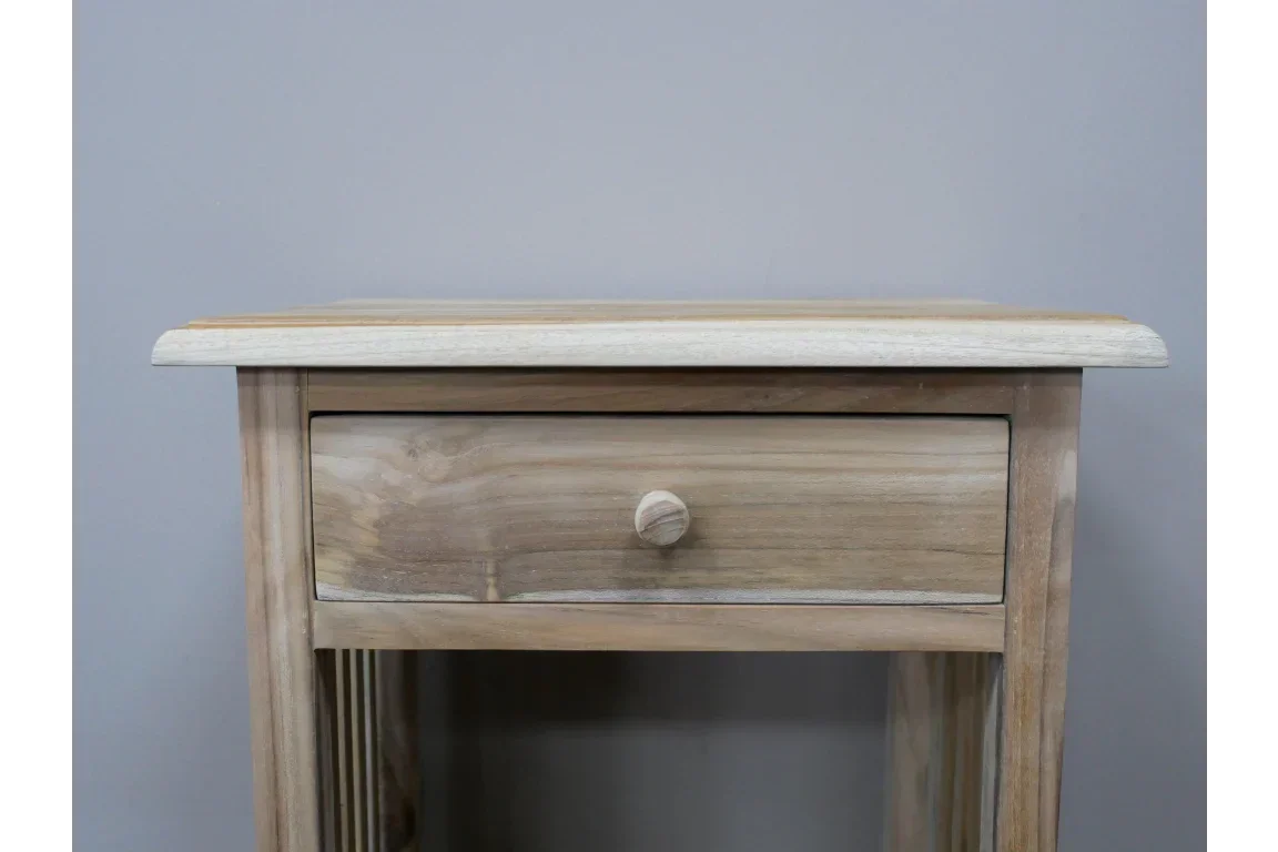 Light oak bedside table with single drawer and round wooden handle, front view