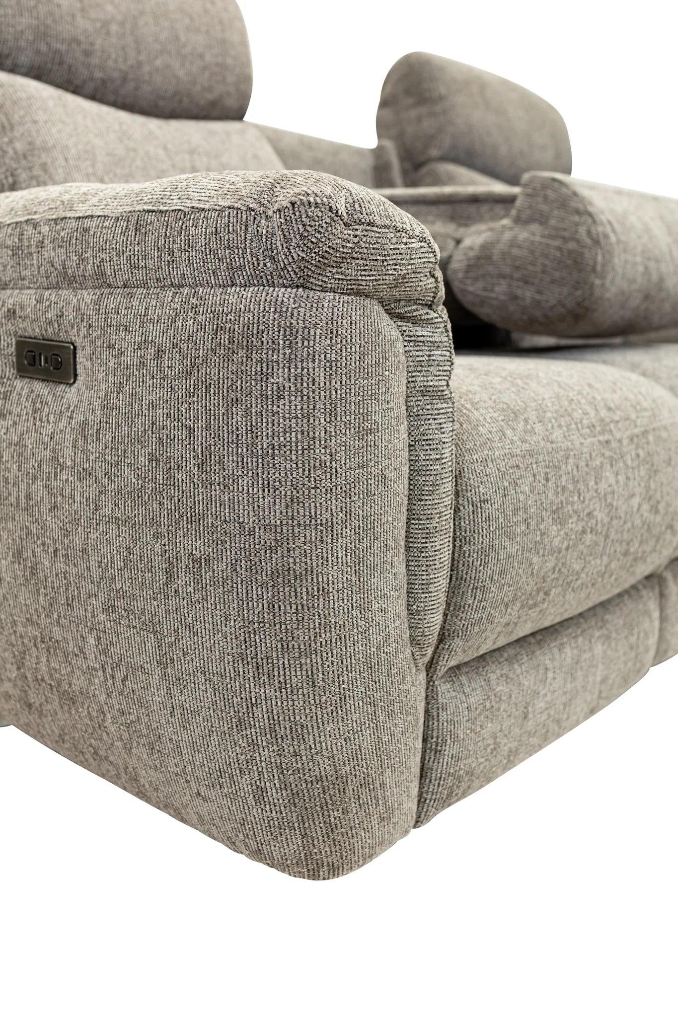 Close-up of a gray textured recliner sofa showing the armrest, side panel, and part of the seat cushion against a white background.