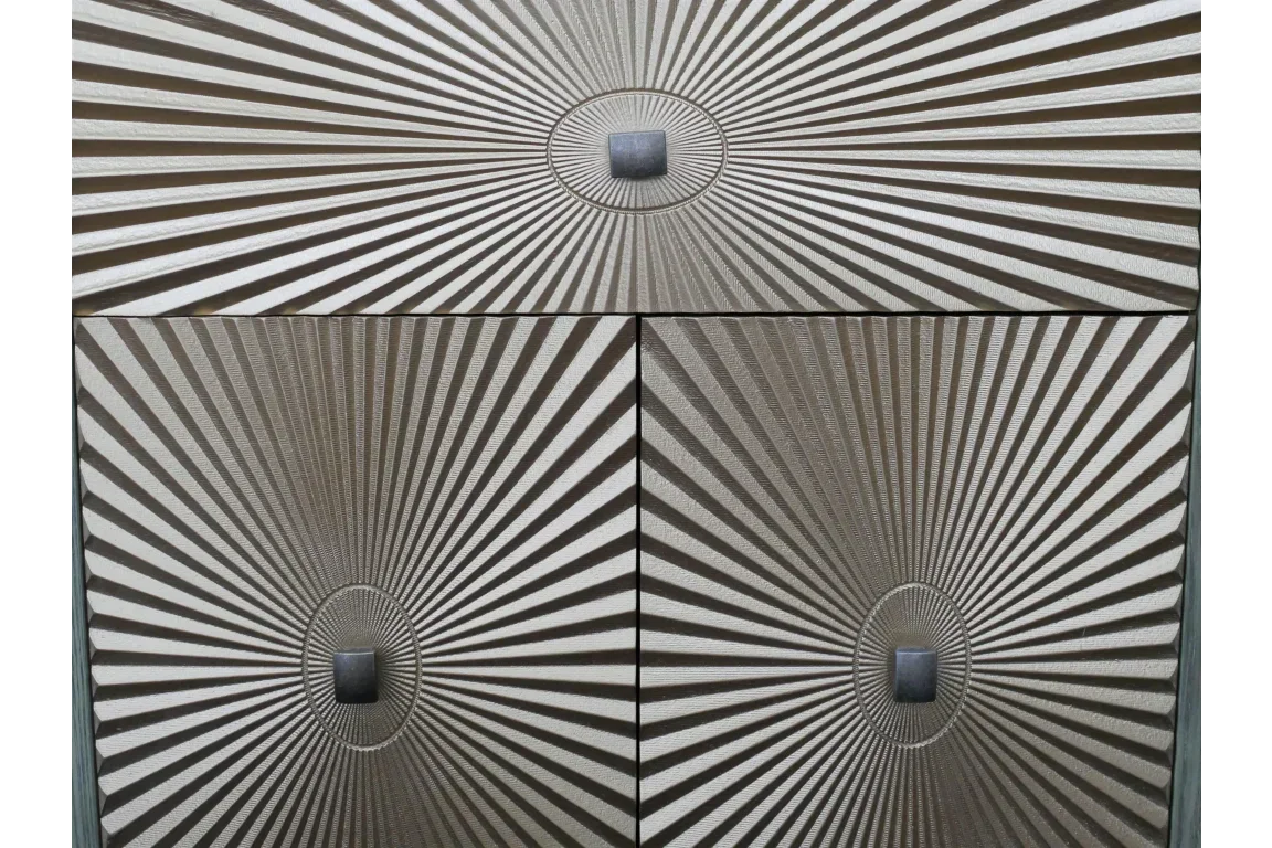 Textured wood chest of drawers with geometric sunburst pattern and square metal handles
