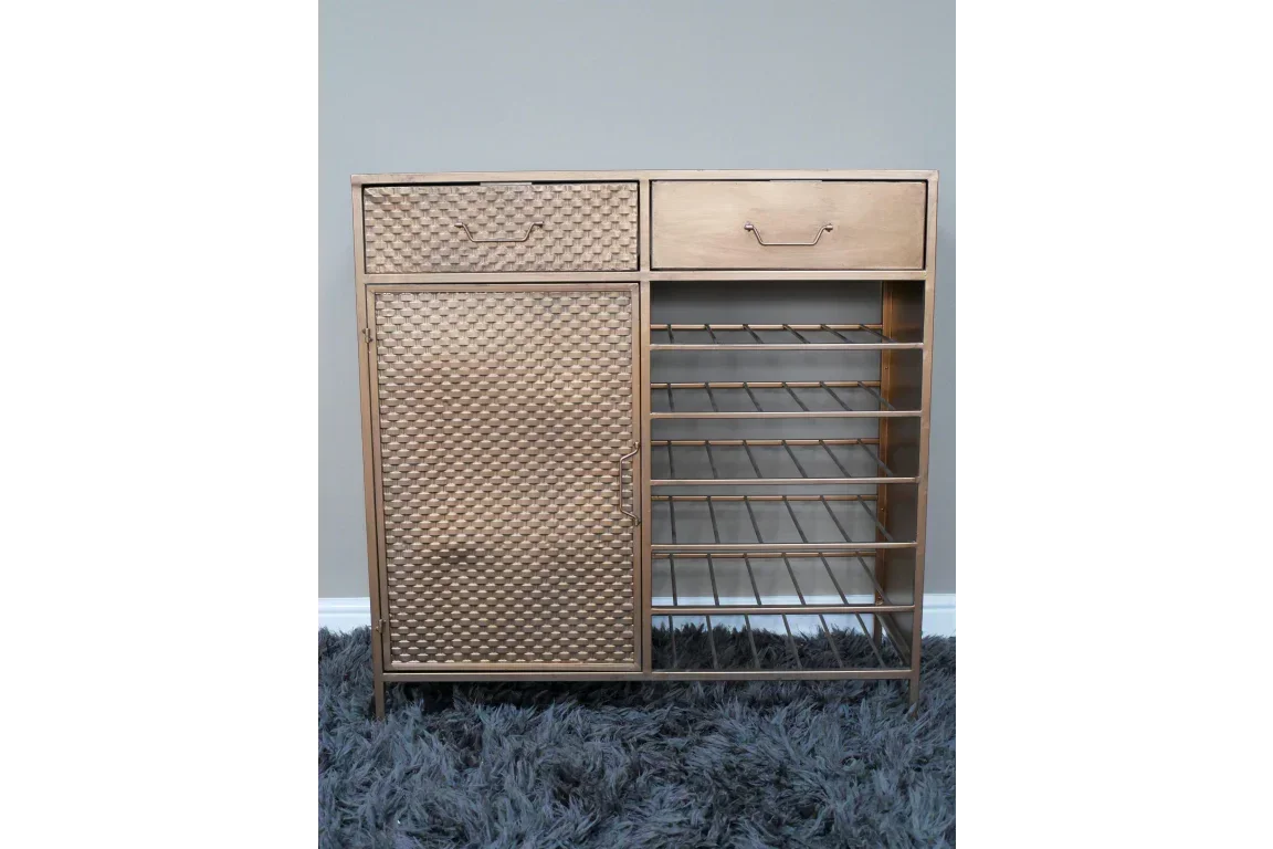 Gold metal wine rack cabinet with textured door, two drawers, and open side shelves
