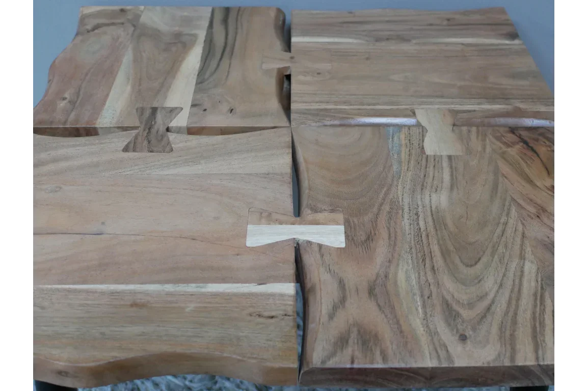 Solid wood coffee table top with butterfly joints and natural grain finish