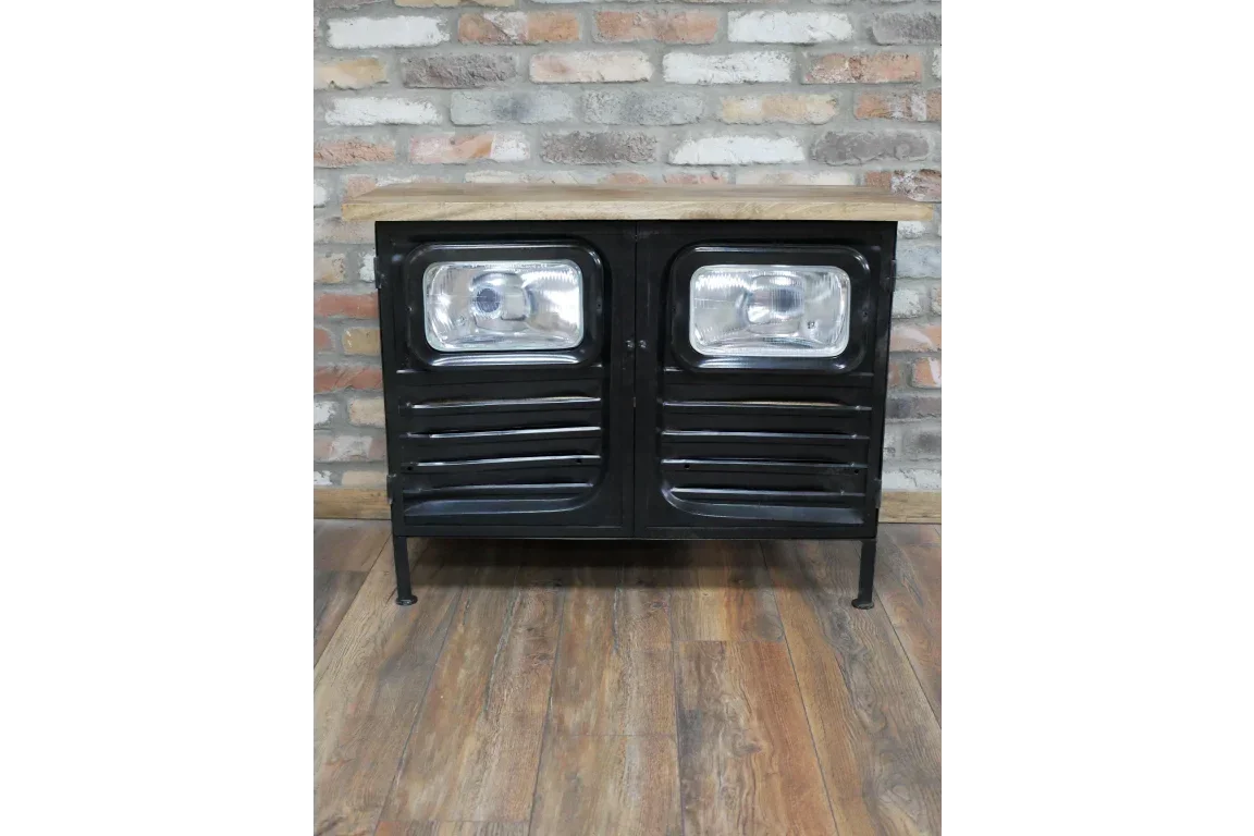 Industrial style sideboard with black metal doors, wood top, and headlight detail