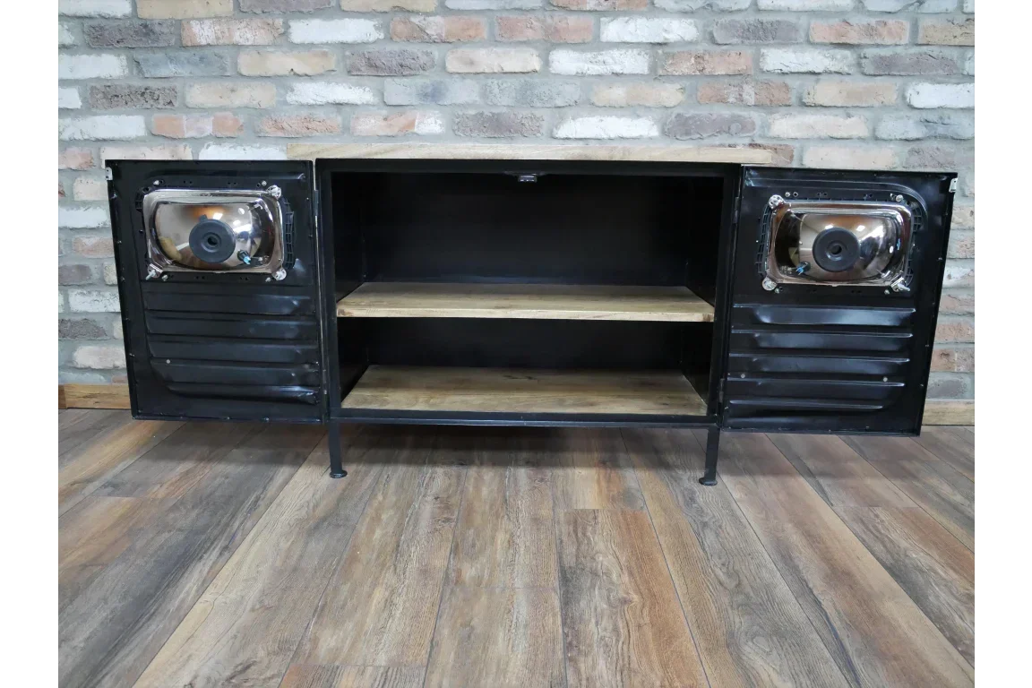 Industrial TV unit with open metal doors, wood shelves and brick wall backdrop