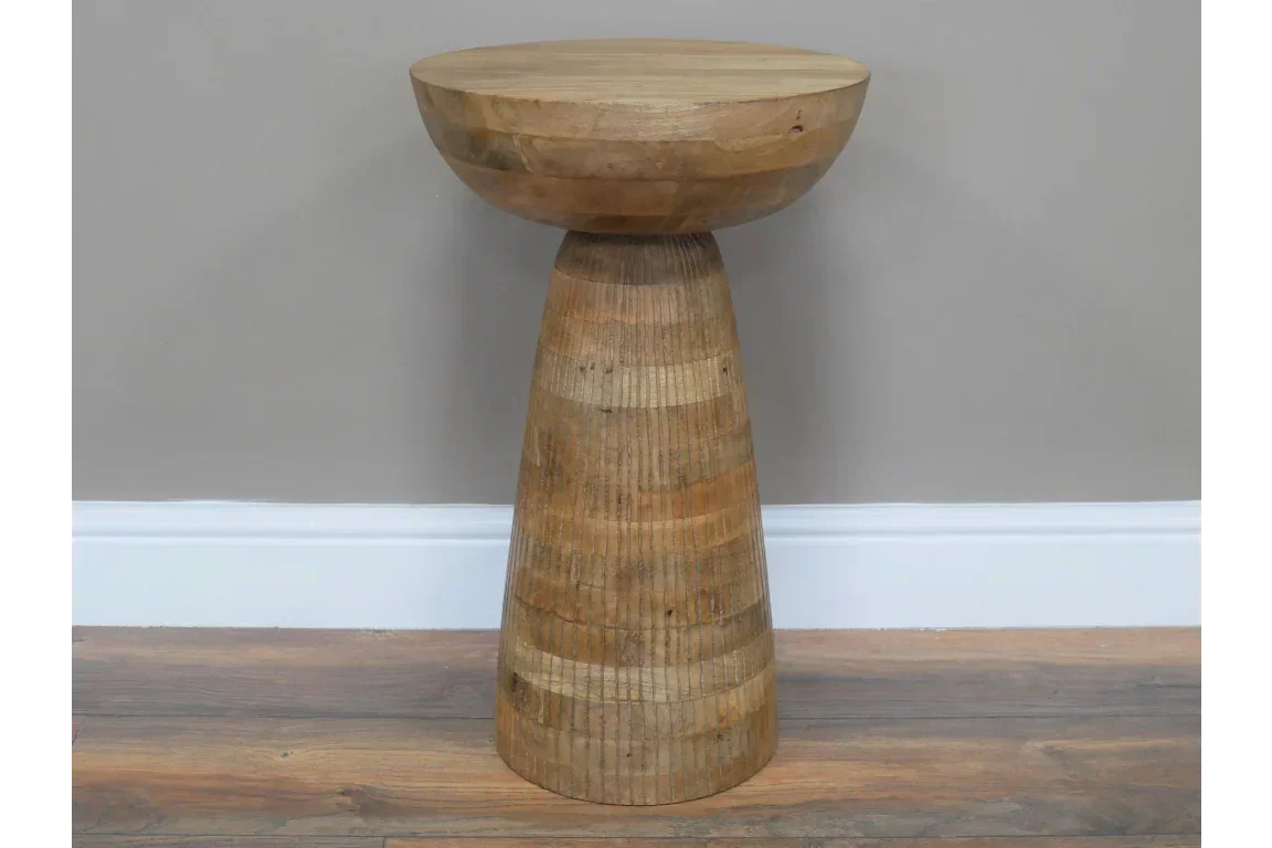Solid wood side table with natural finish, round top and conical base on wooden floor