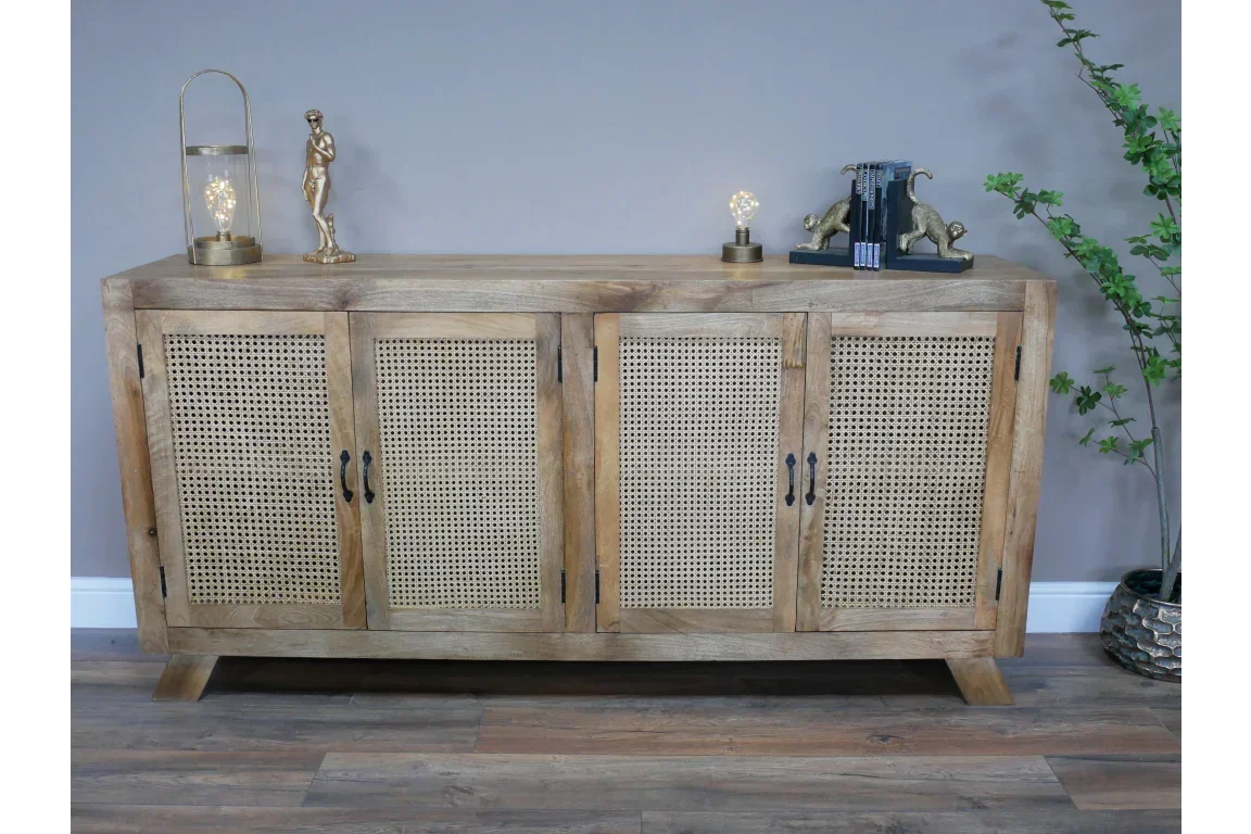 Natural rattan sideboard with four cane doors, black handles, decorative ornaments on top