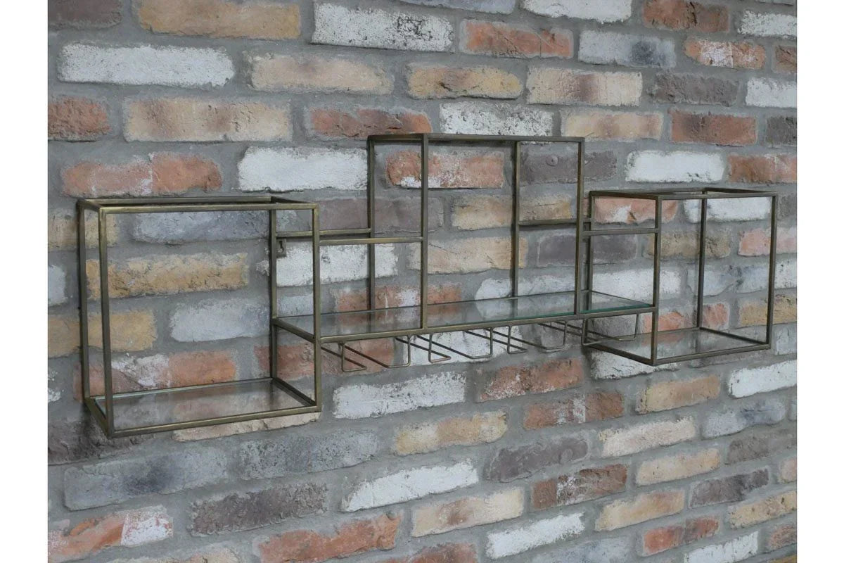 Metal and glass wall shelves in geometric design mounted on brick wall