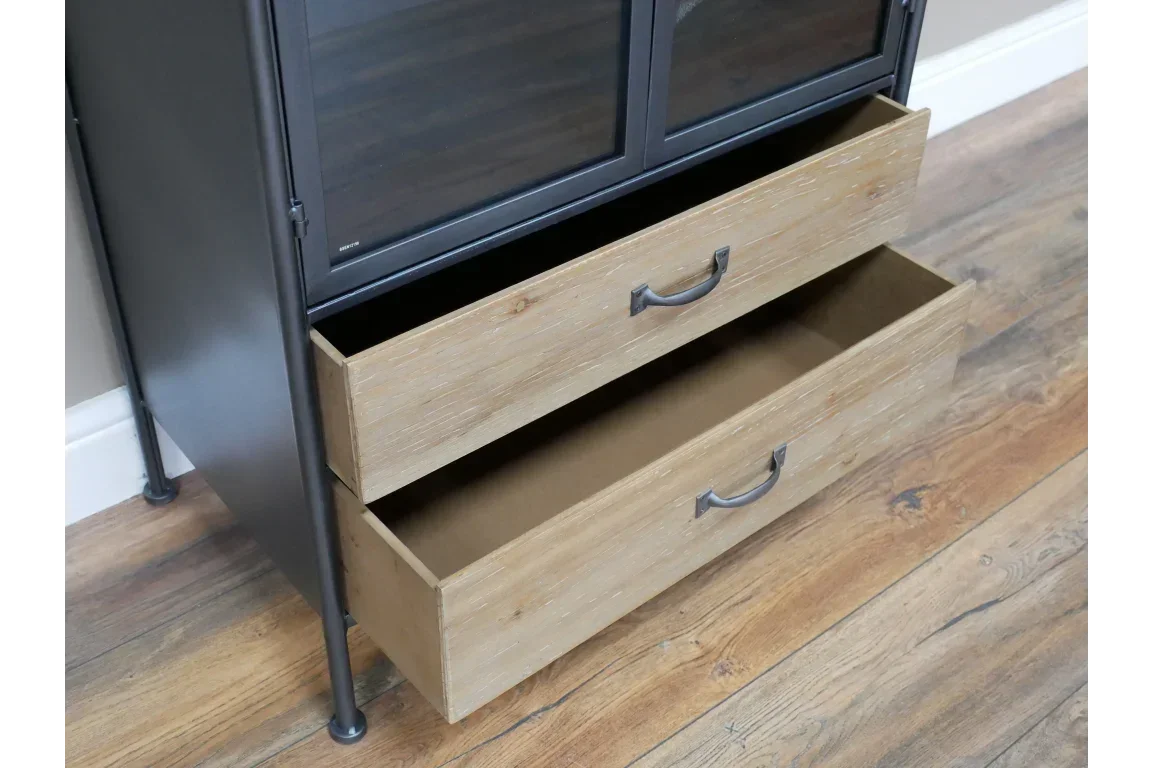 Industrial storage cabinet with two open wood drawers and black metal frame on wood floor