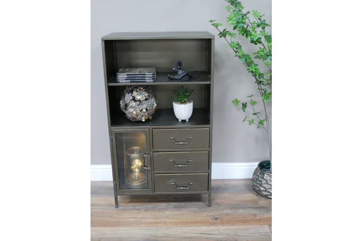 Metal display cabinet with three drawers, glass door and open shelves styled with decor