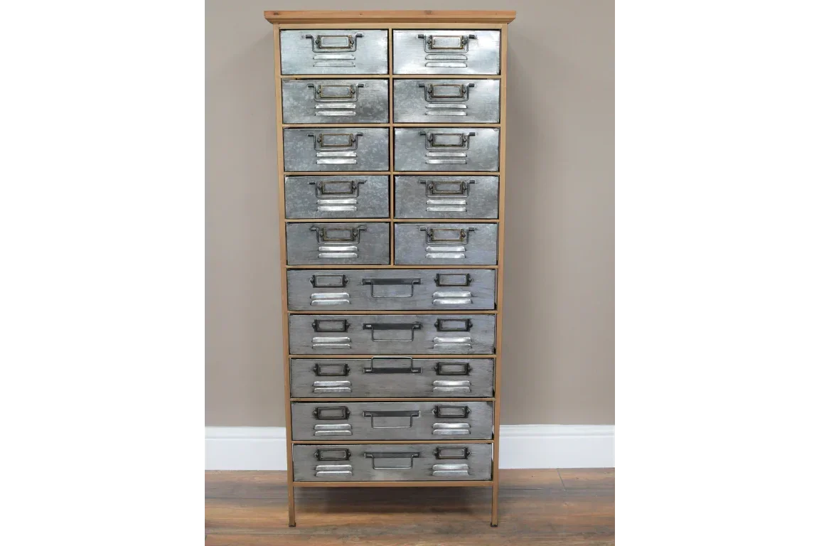 Tall industrial storage cabinet with multiple metal drawers and wood frame on wooden floor