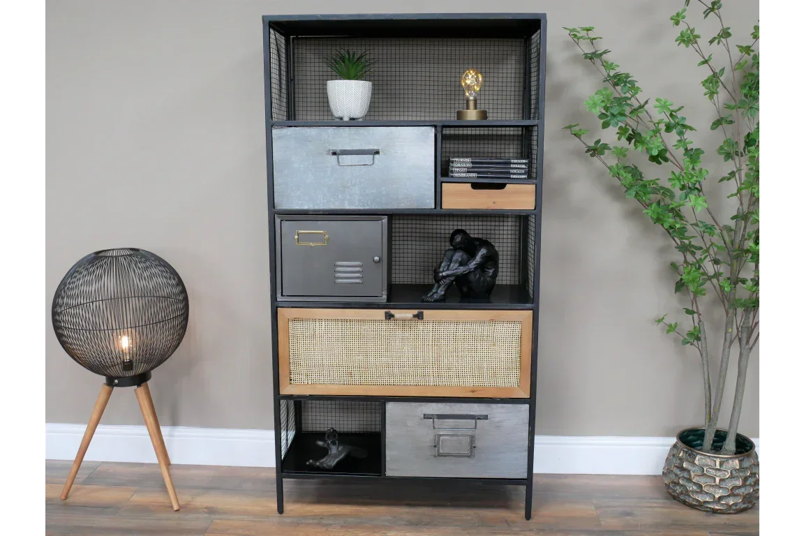 Industrial metal and wood shelving unit with mixed drawers and open shelves, styled decor items