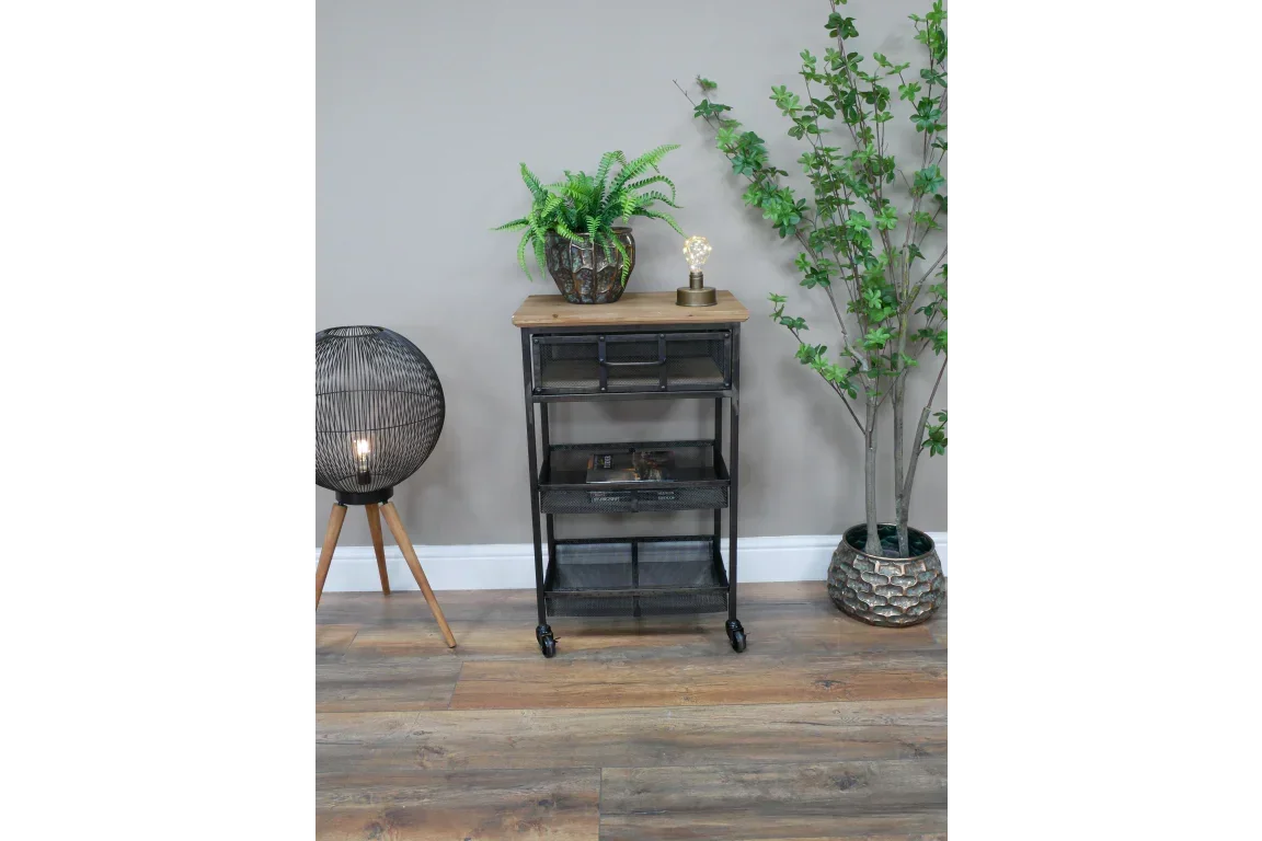 Industrial metal and wood shelving unit with three mesh drawers in modern living room