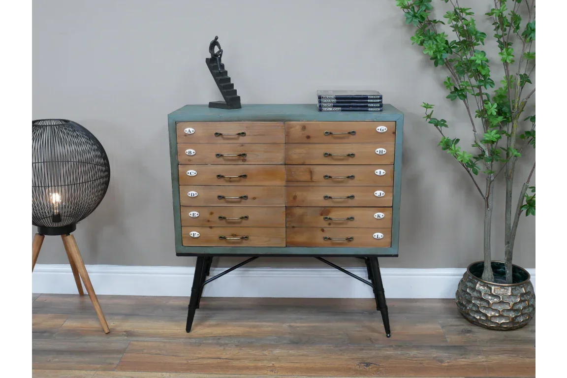 Industrial wood storage chest with twelve drawers and metal legs in living room setting