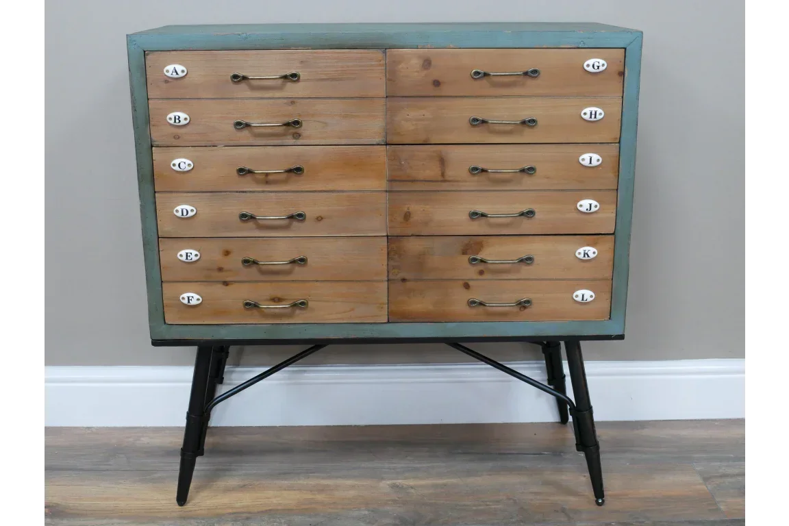 Wooden chest of drawers with twelve lettered handles and angled black legs