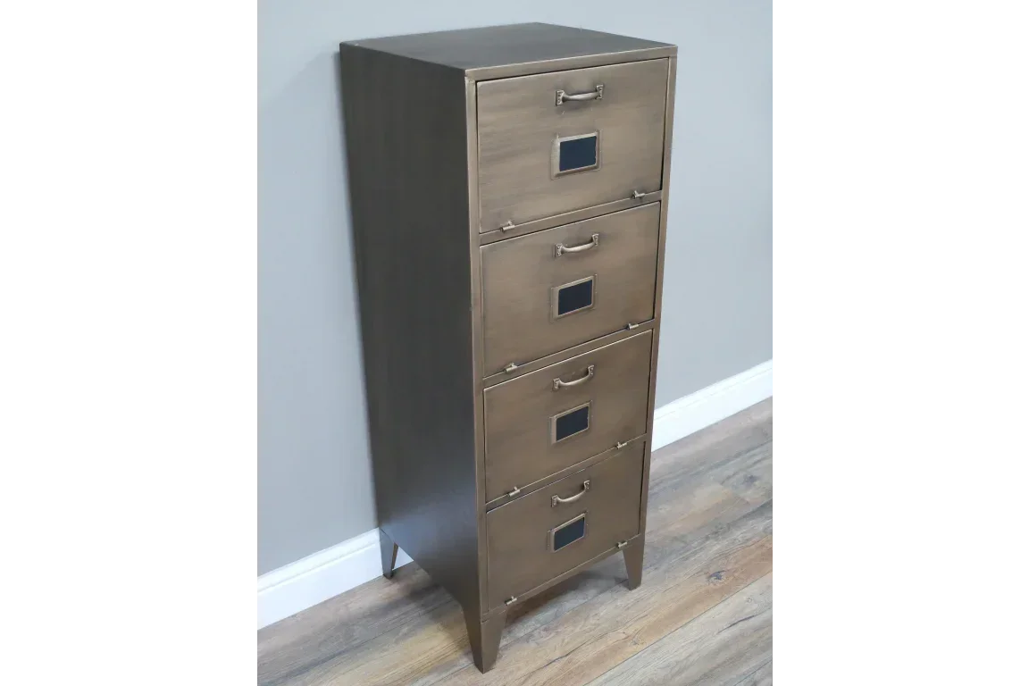 Tall metal filing cabinet with four drawers and label holders against grey wall