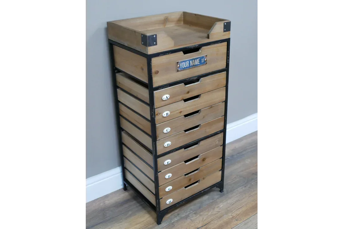 Industrial wood chest of drawers with black metal frame and eight labelled storage drawers
