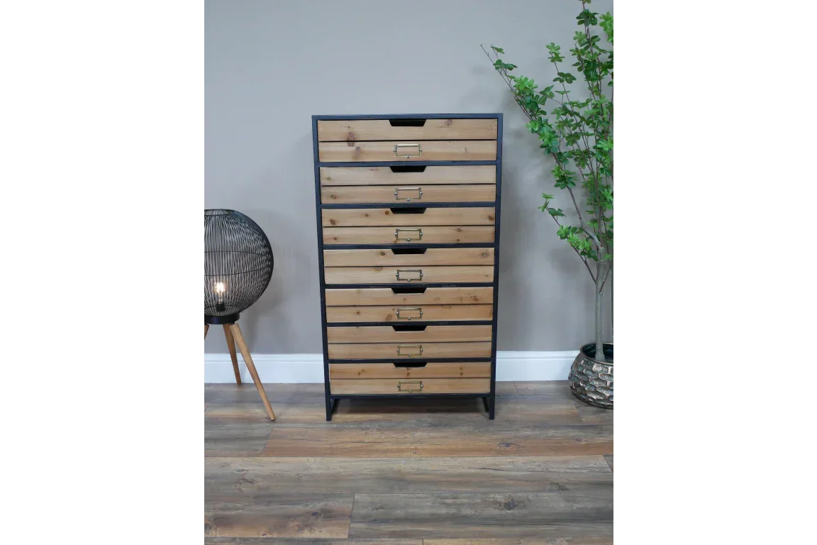 Industrial wood chest of drawers with black metal frame and eight drawers in modern room