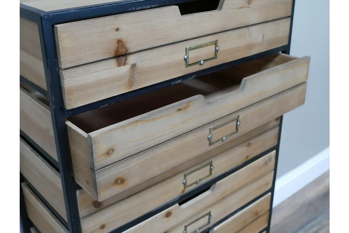 Industrial wooden chest of drawers with open drawer, metal frame, and label holders