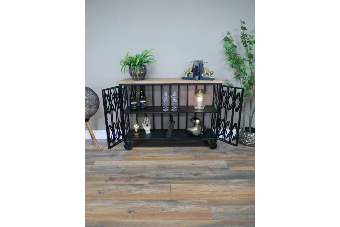 Black metal and wood sideboard with open doors, wine storage and decorative items