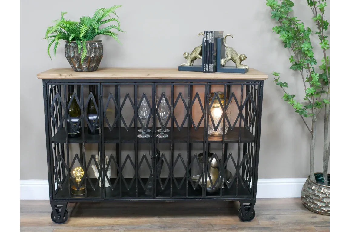Industrial sideboard with metal frame, wood top, glassware and bottles on shelves