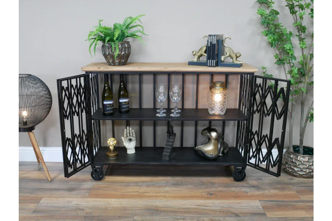 Industrial black metal sideboard with wooden top, three shelves, and decor accents